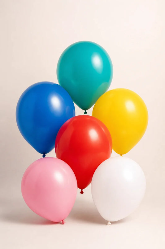 11 inch assorted plain latex balloons in a professional studio product photo