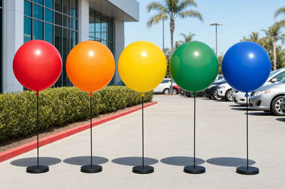 Large outdoor plain balloons displayed on weighted bases