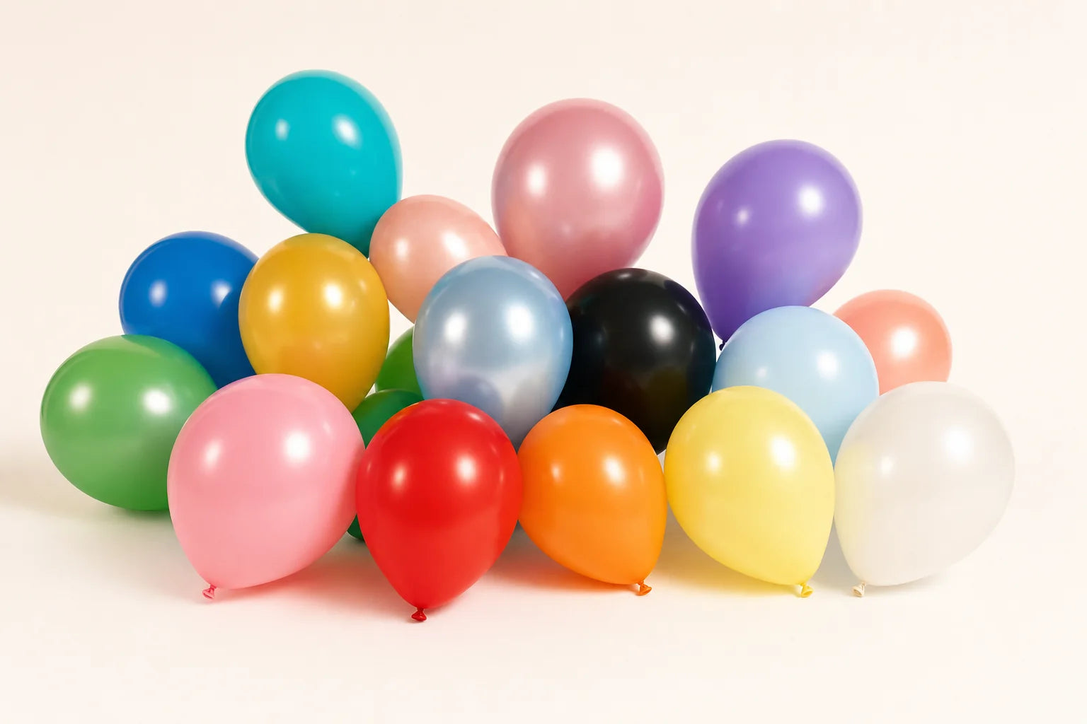 Assorted color plain latex balloons arranged for product display