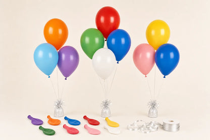 Plain helium balloons with strings, weights, and ribbon setup